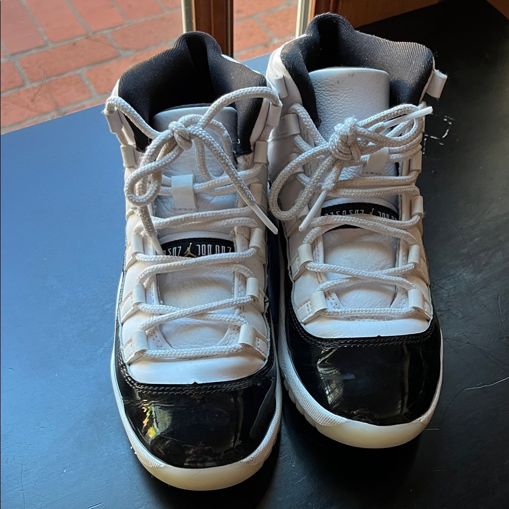 Kids Jordan Black and White High-Top Sneakers